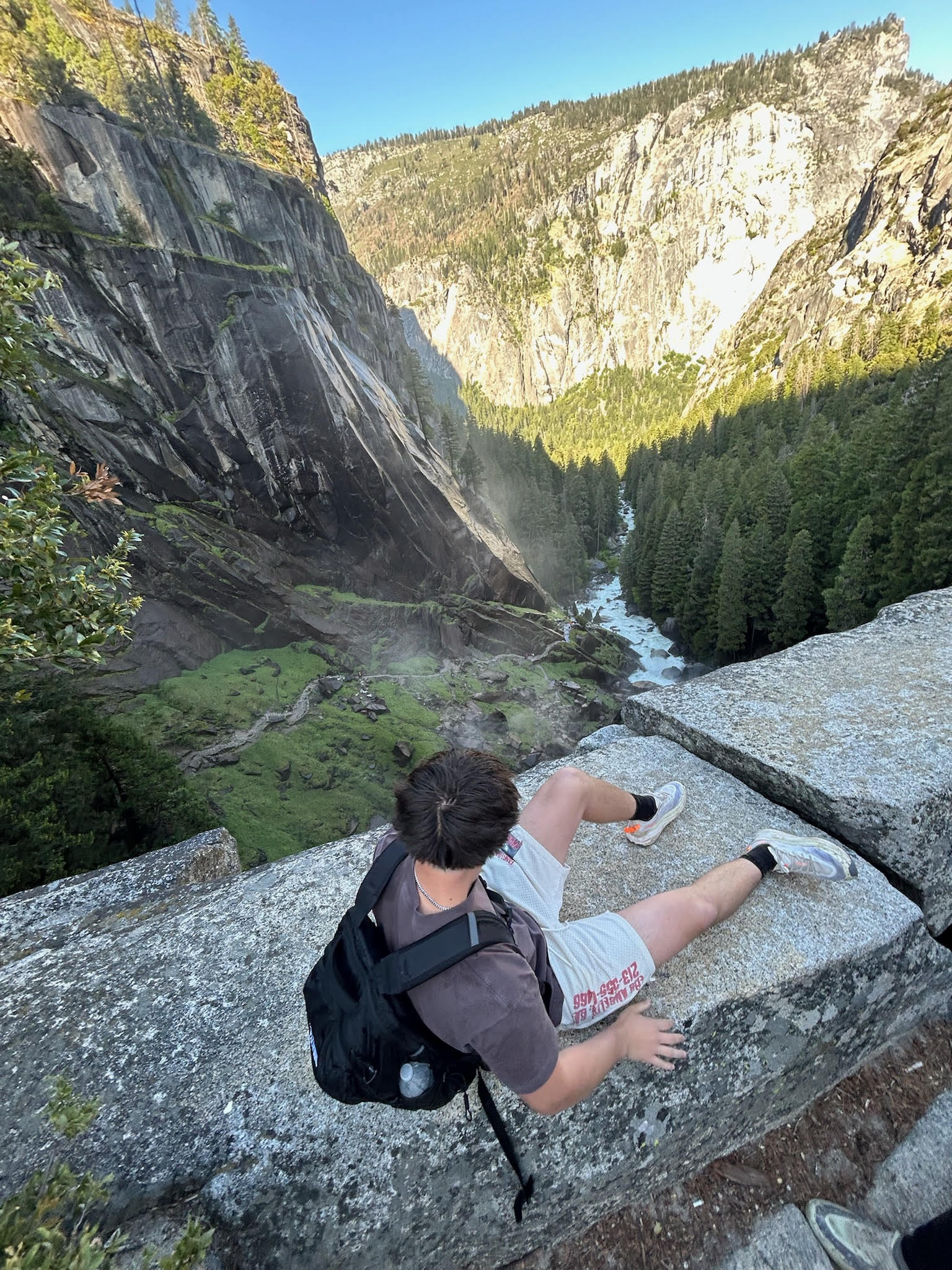 Hunter overlooking a mountain valley